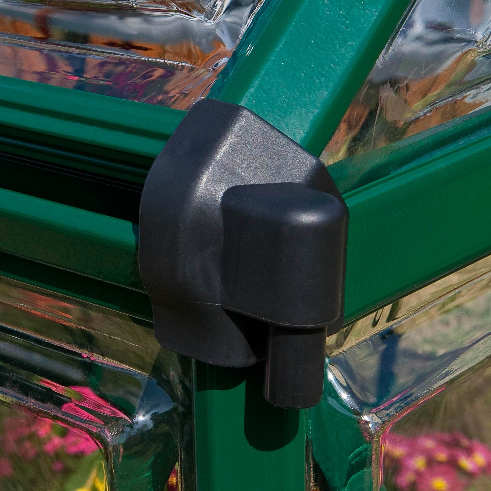 Gutters on a green greenhouse